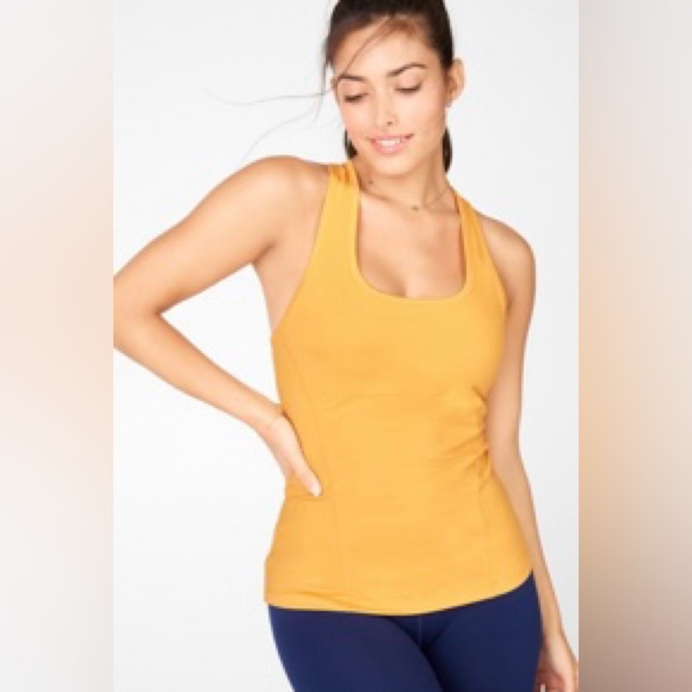 Fabletics Racerback Tank Top in Ochre
